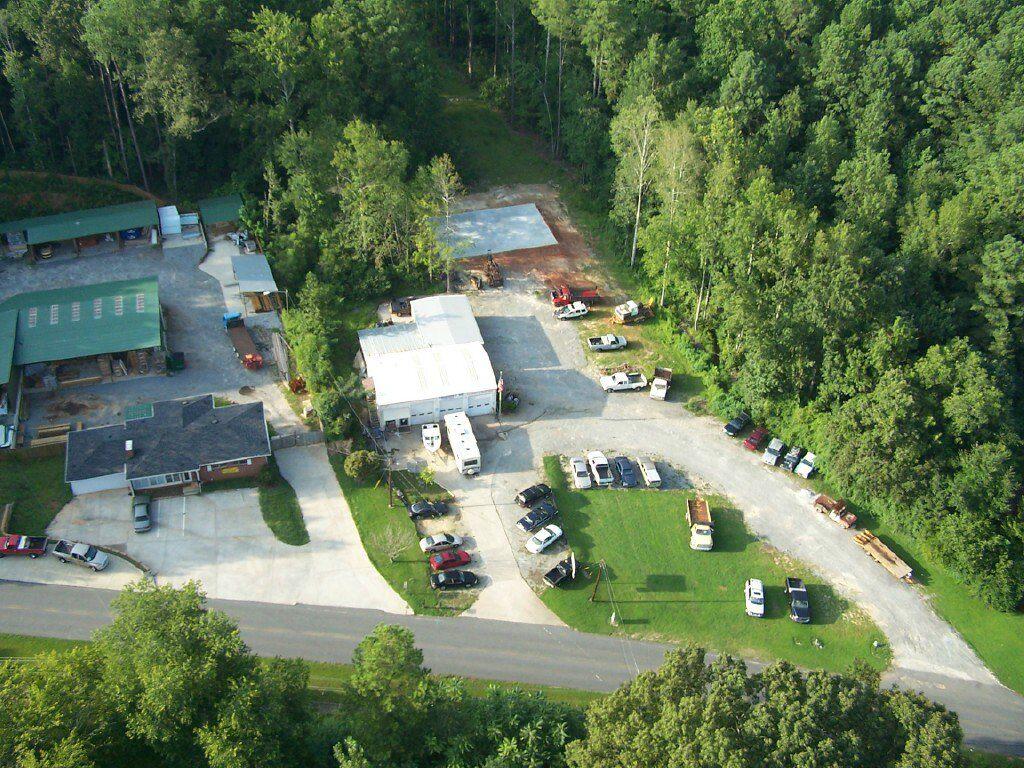 Sky View Exterior of Moore's Auto Shop in hollysprings